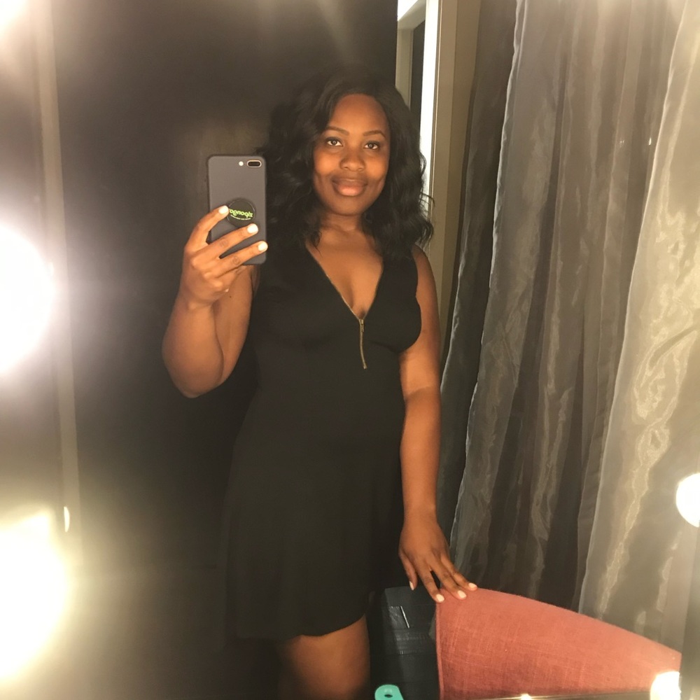 Monteau High-low little black dress with zip front & leatherette detail.